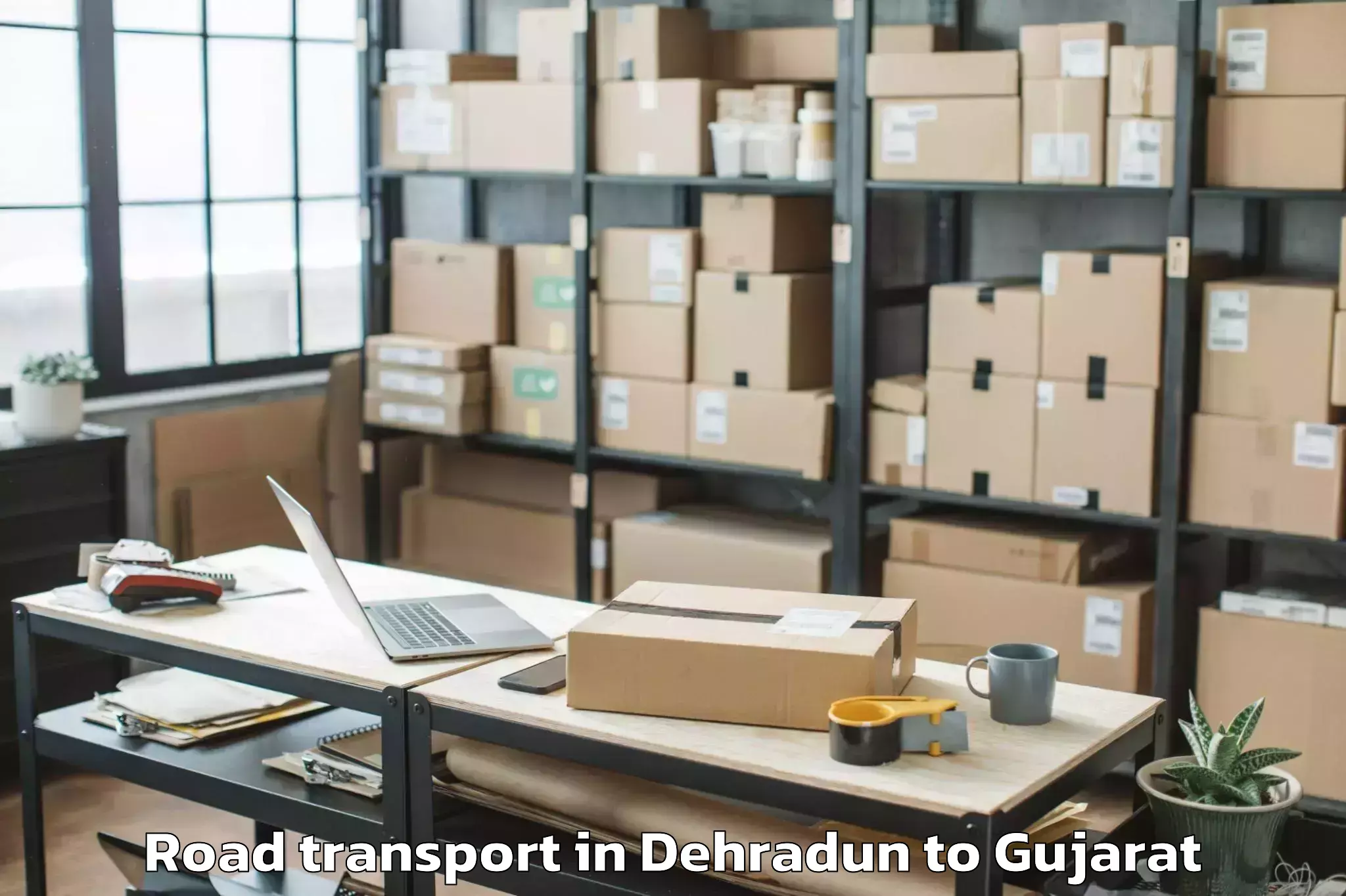 Easy Dehradun to Jasdan Road Transport Booking